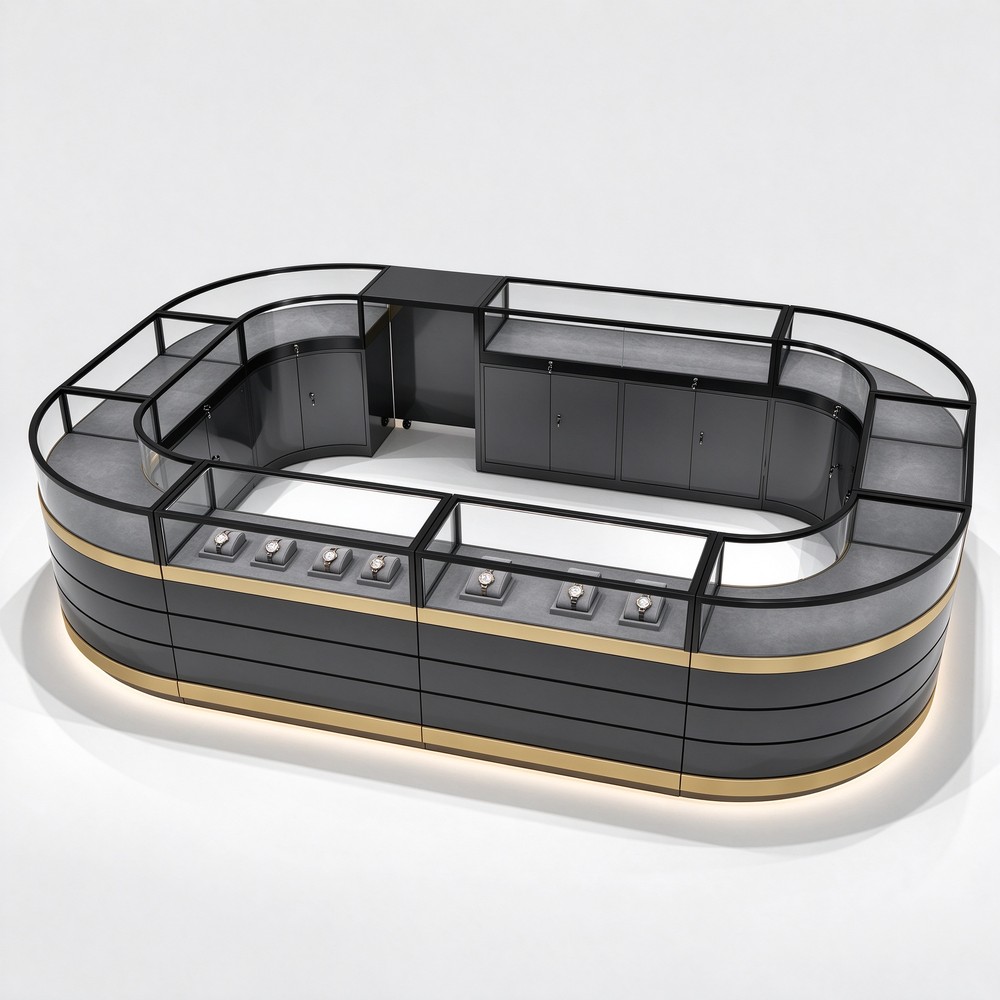 Rounded black clear-top jewelry counter enclosure with gold-tone bands and inner staff area
