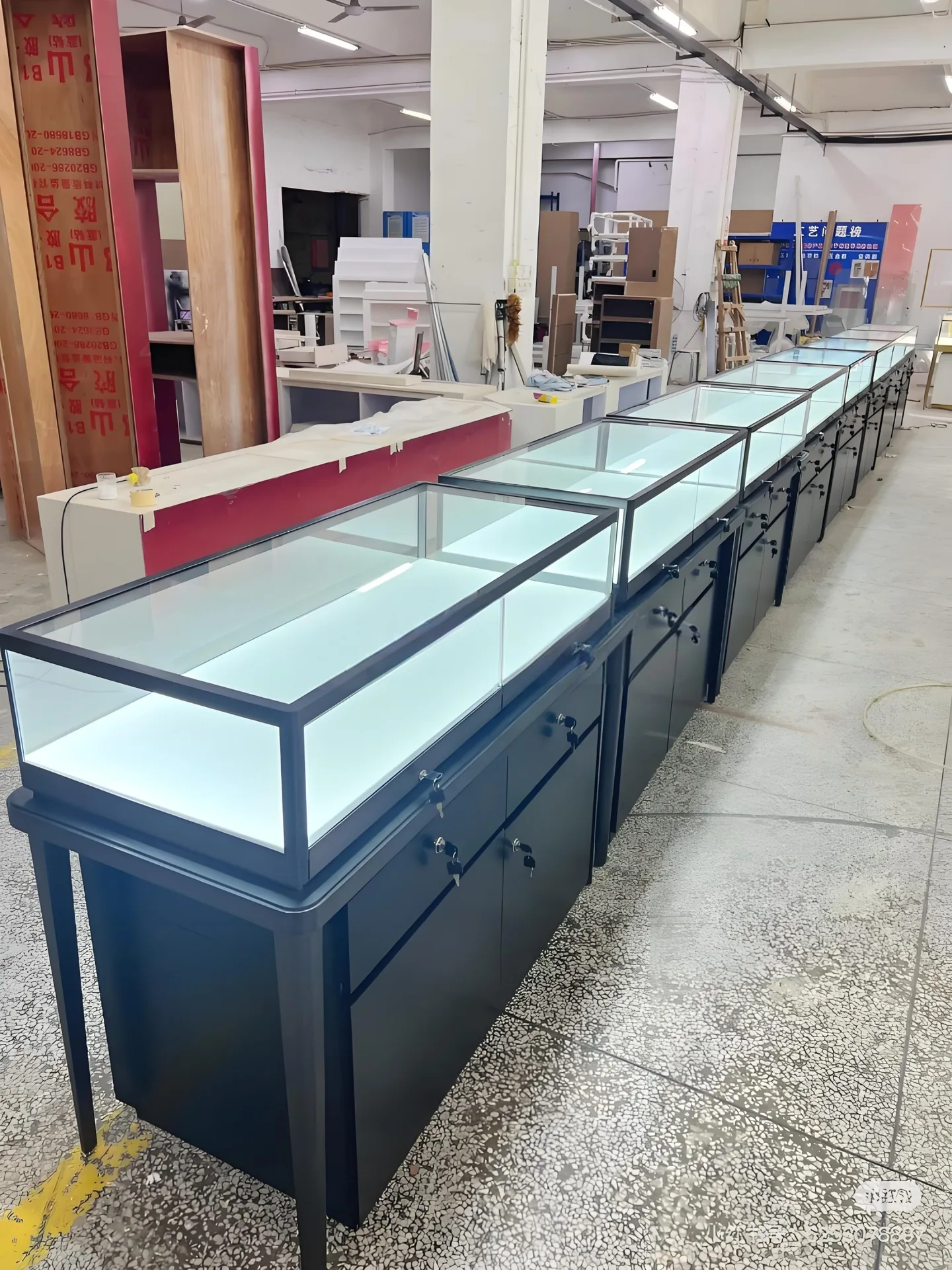 Black Steel Frame Glass Jewelry Display Counter With Drawer Storage