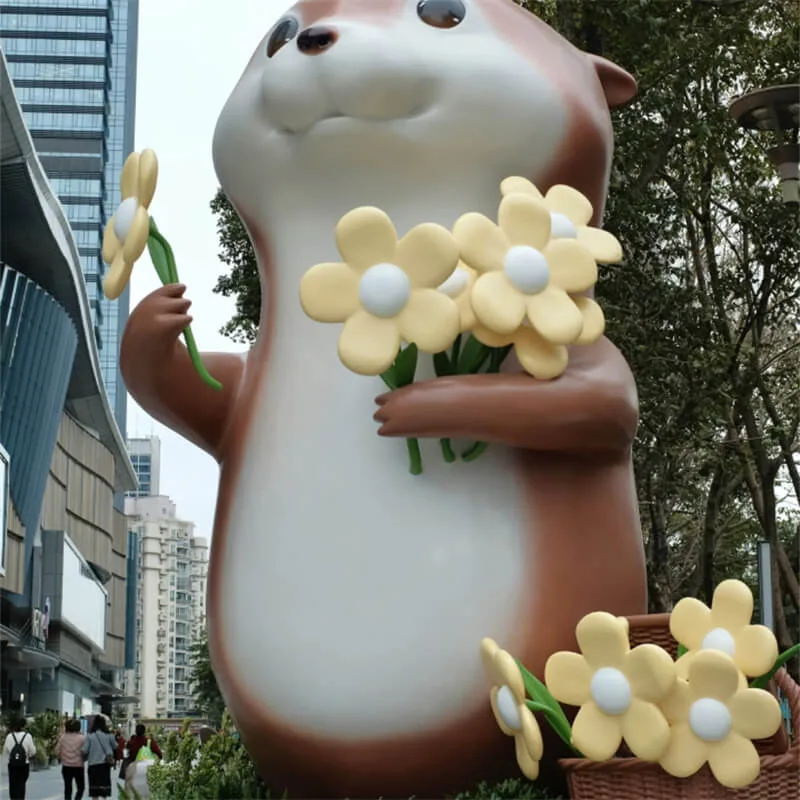 Cartoon Flower-Holding Otter Fiberglass Sculpture | Outdoor Plaza IP Decor Statue | Custom Cute Otter Ornament — view 2