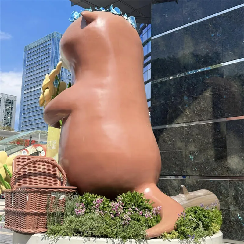 Cartoon Flower-Holding Otter Fiberglass Sculpture | Outdoor Plaza IP Decor Statue | Custom Cute Otter Ornament — view 3
