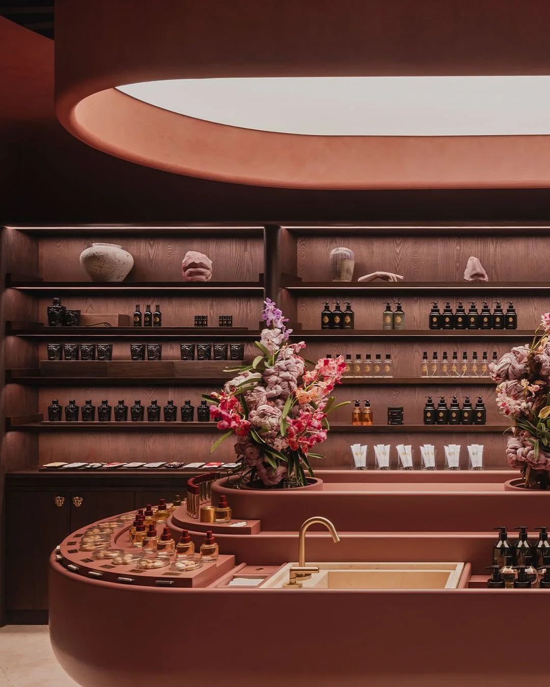 Curved Terracotta Plaster Perfume Boutique Service Counter & Backlit Wall Display — view 2