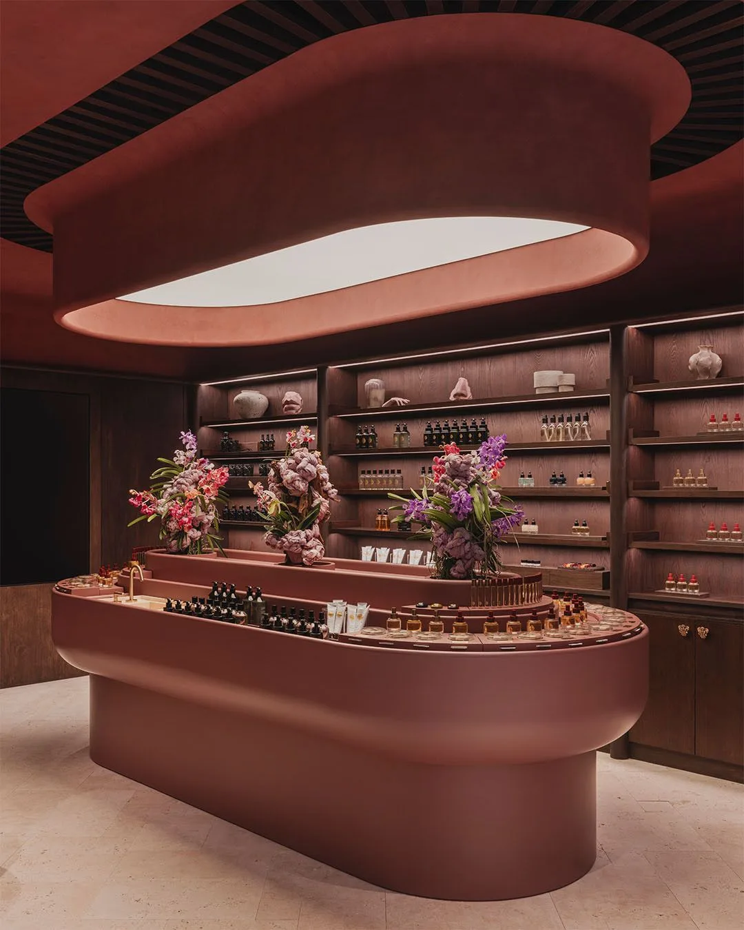 Curved Terracotta Plaster Perfume Boutique Service Counter & Backlit Wall Display