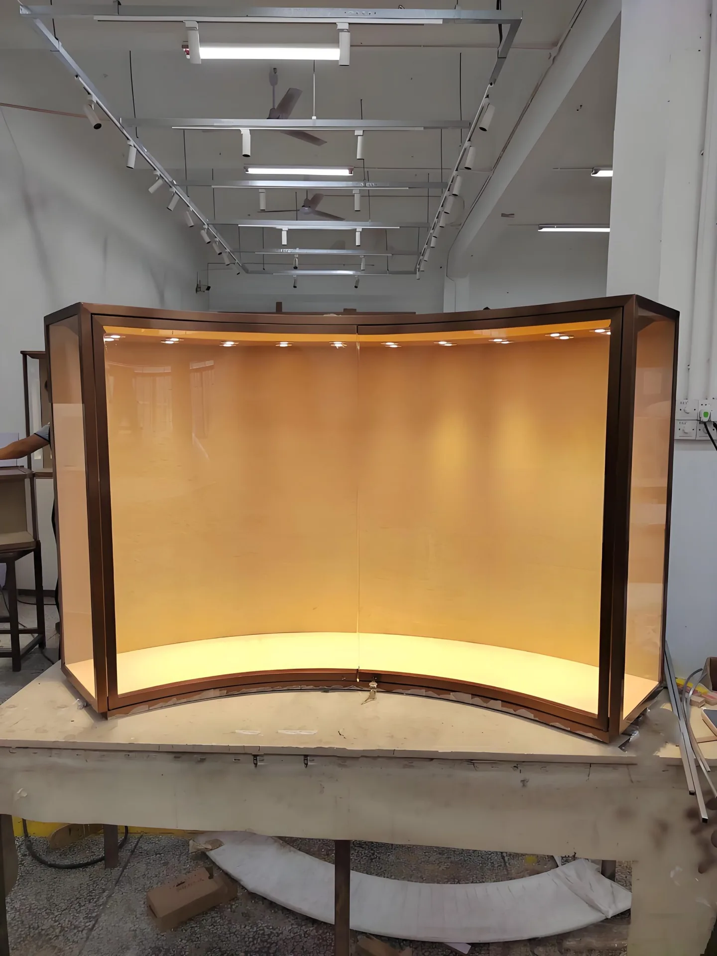 Curved Wooden Glass Display Cabinet with Embedded Top LED Spotlights and Base Strip Light — view 3