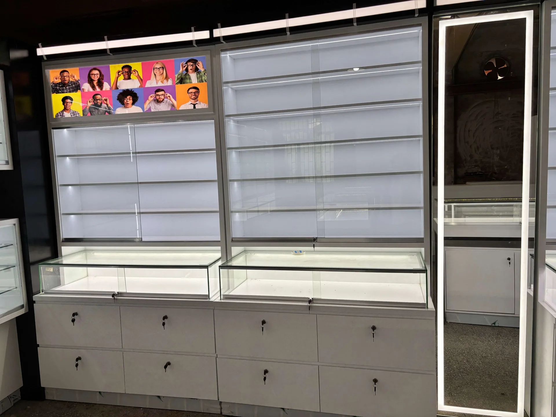 Custom Optical Wall Display Cabinet with LED Lighting | Tempered Glass Shelves & Lockable Storage Drawers for Eyewear Stores – White, Black, — view 5
