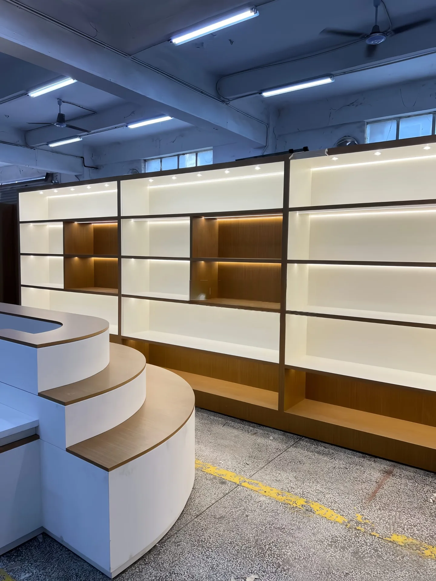 Custom Retail Store Display Set | Wall-Mounted Showcase with LED Backlight and Curved Island Stand — view 2