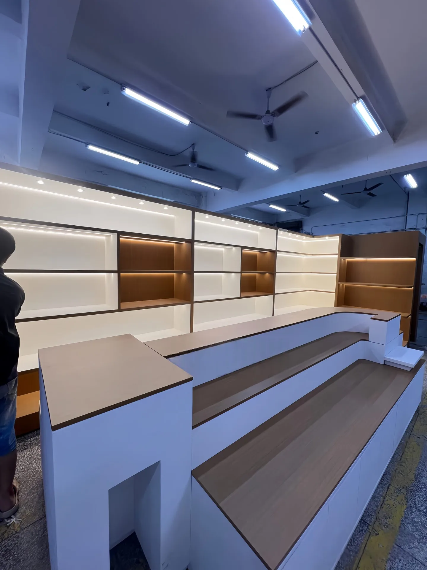 Custom Retail Store Display Set | Wall-Mounted Showcase with LED Backlight and Curved Island Stand — view 3
