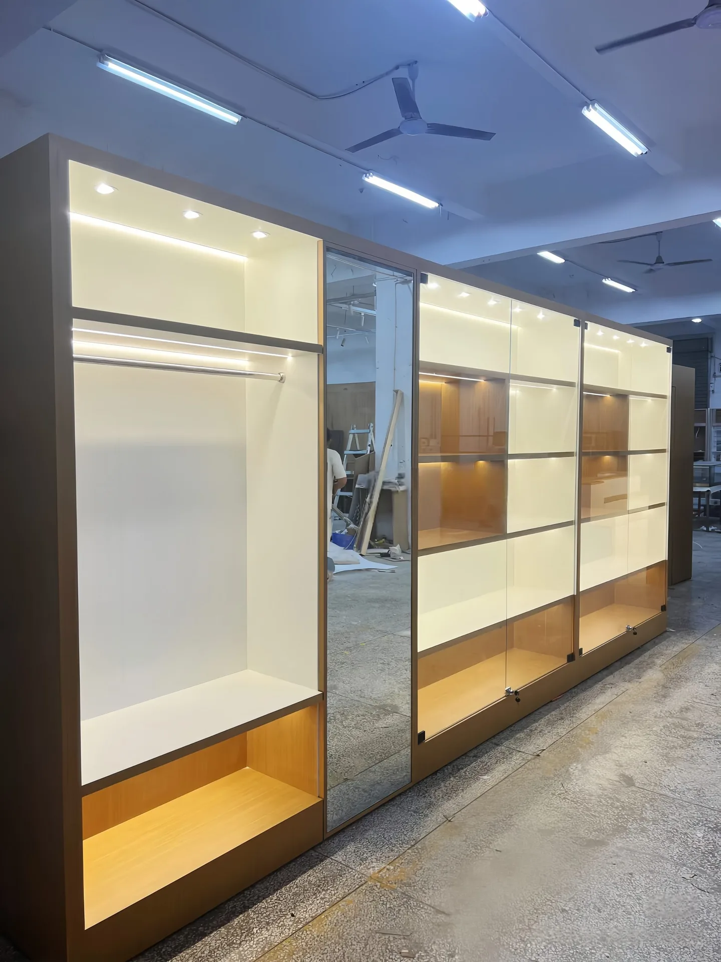 Custom Retail Store Display Set | Wall-Mounted Showcase with LED Backlight and Curved Island Stand — view 4