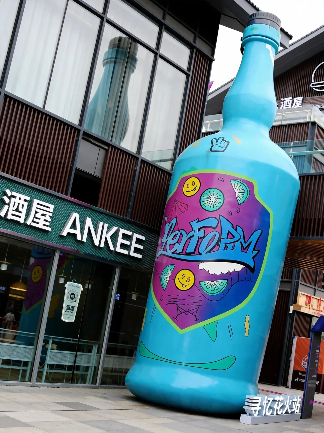 Glossy Blue FRP Giant Wine Bottle Sculpture with Graffiti Label for Bar Street Mall Decor — view 4