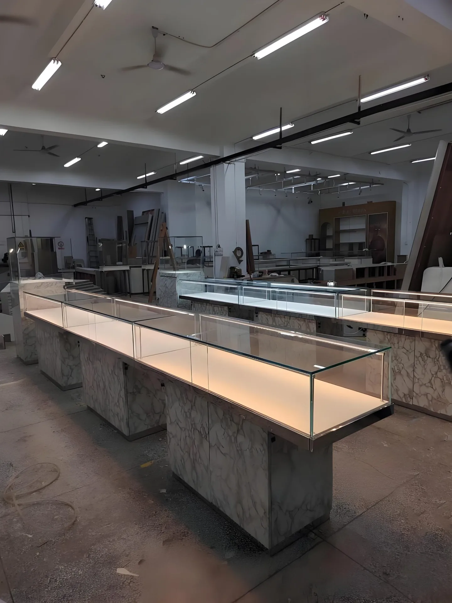 Long Marble‑Effect Base Glass Jewelry Display Counter With Built‑in LED Lighting — view 3