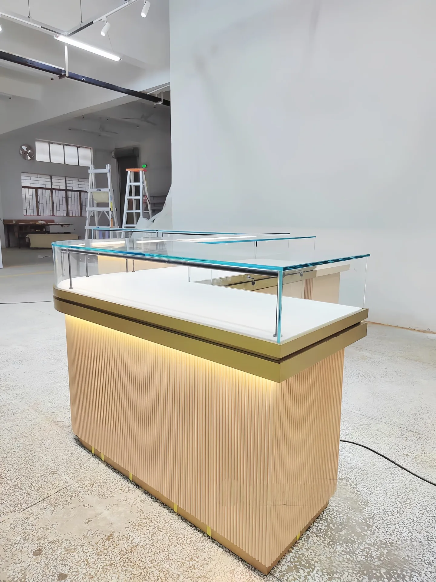 Luxury Boutique Glass Jewelry Counter with Gold Trim and Hidden Light Strip — view 3