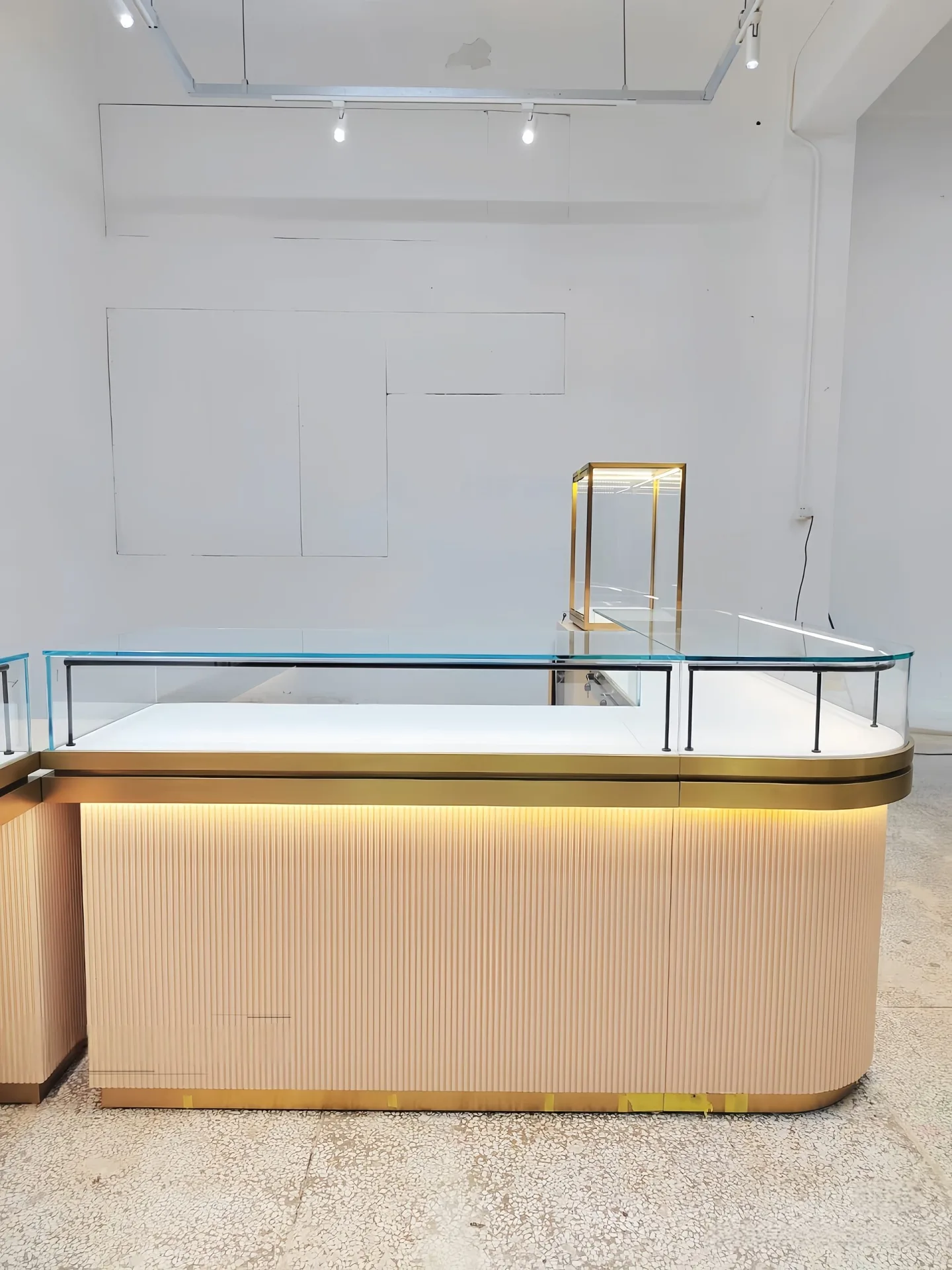 Luxury Boutique Glass Jewelry Counter with Gold Trim and Hidden Light Strip — view 5