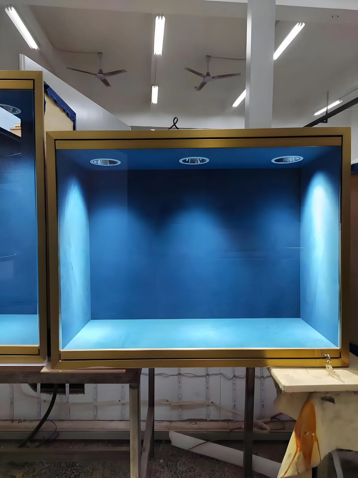 Luxury Retail Glass Display Cabinet | Gold Frame Showcase With Recessed LED Spotlights