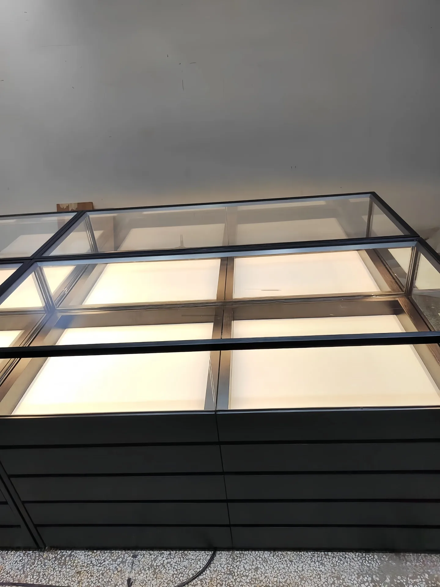 Modern Black Retail Display Counter with Glass Top & Side Multi-Drawer Storage — view 5
