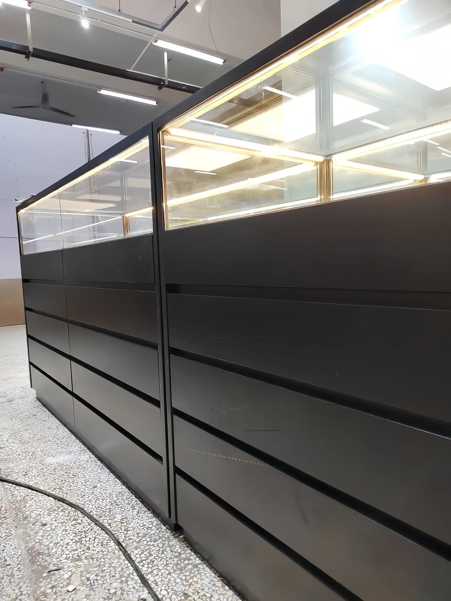 Modern Black Retail Display Counter with Glass Top & Side Multi-Drawer Storage — view 4