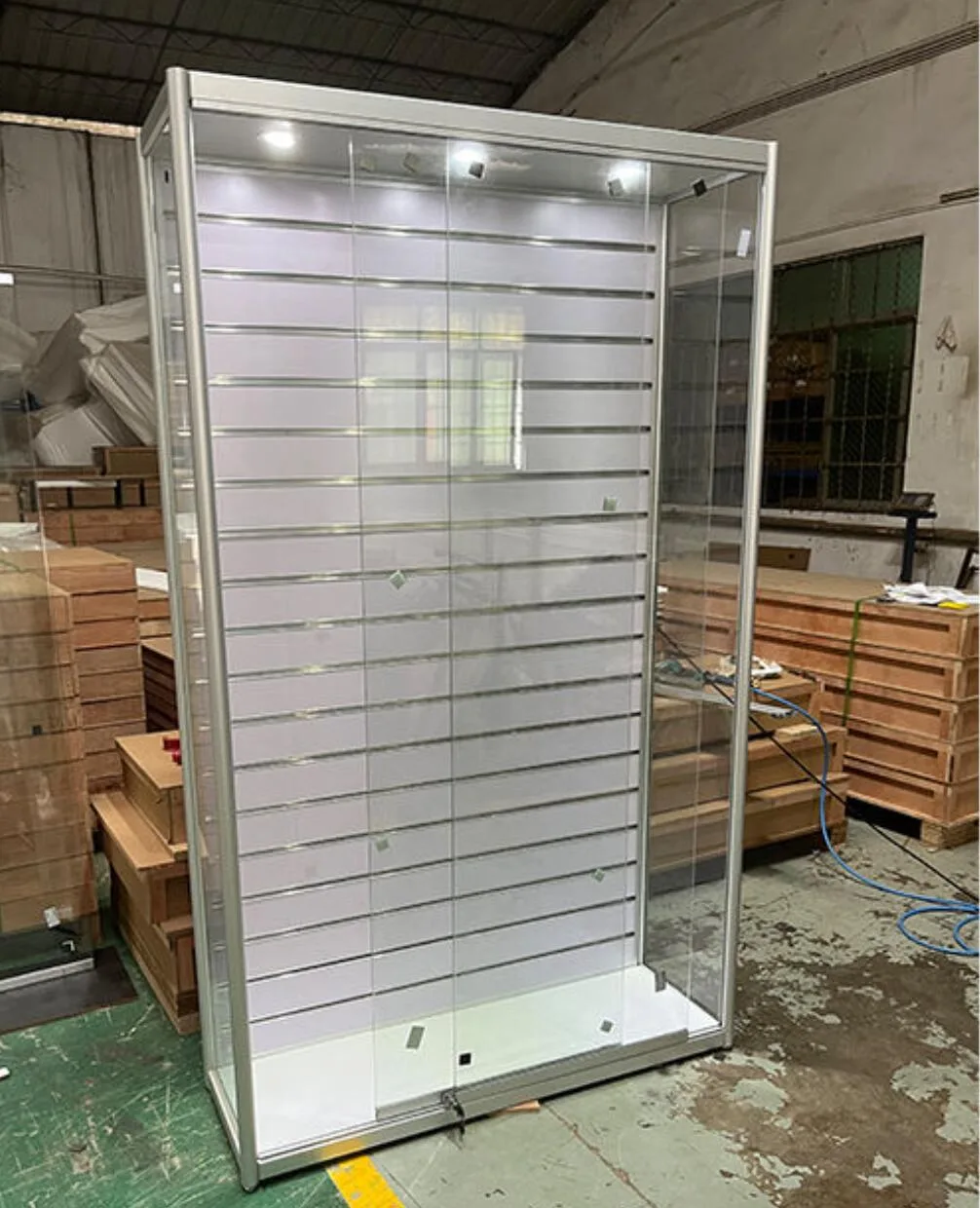 Modern Display Cabinet with Integrated Slatwall & Lighting — product detail 2