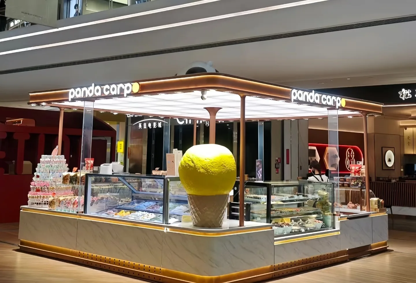 Modern Ice Cream Kiosk Design with Eye-Catching Focal Sculpture