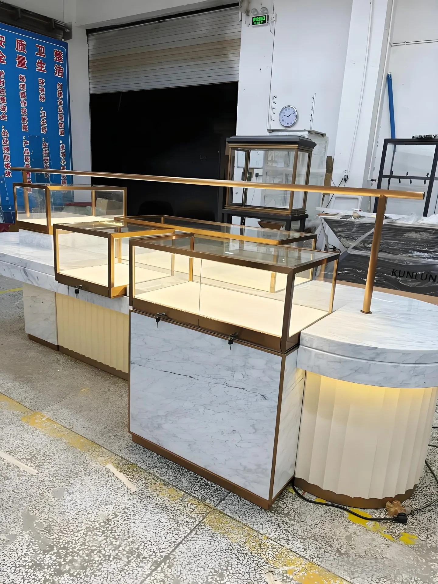 Modern Luxury Combination Display Island | Marble-Top Round Counter & Glass Showcase Units — view 4