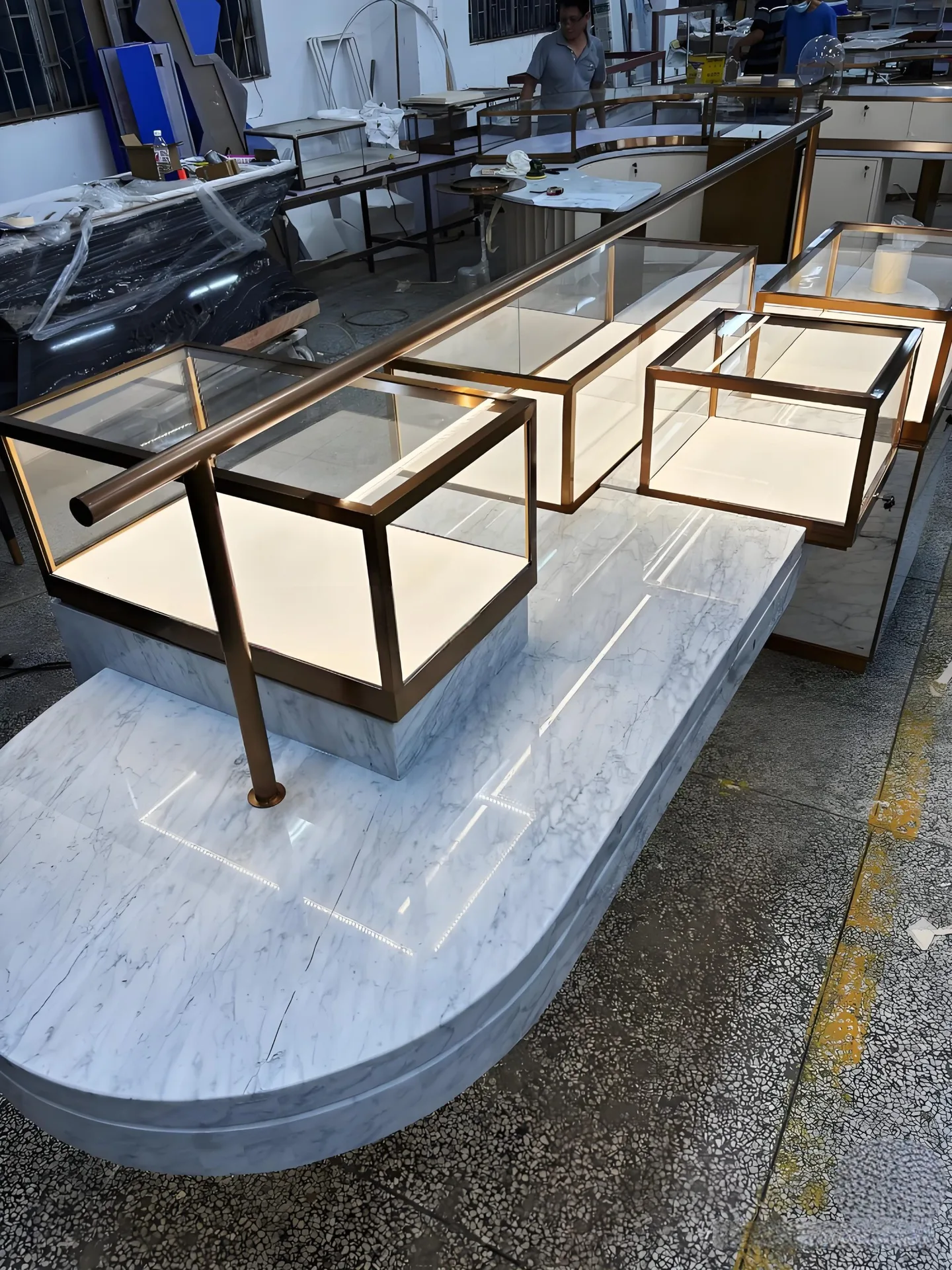 Modern Luxury Combination Display Island | Marble-Top Round Counter & Glass Showcase Units — view 5