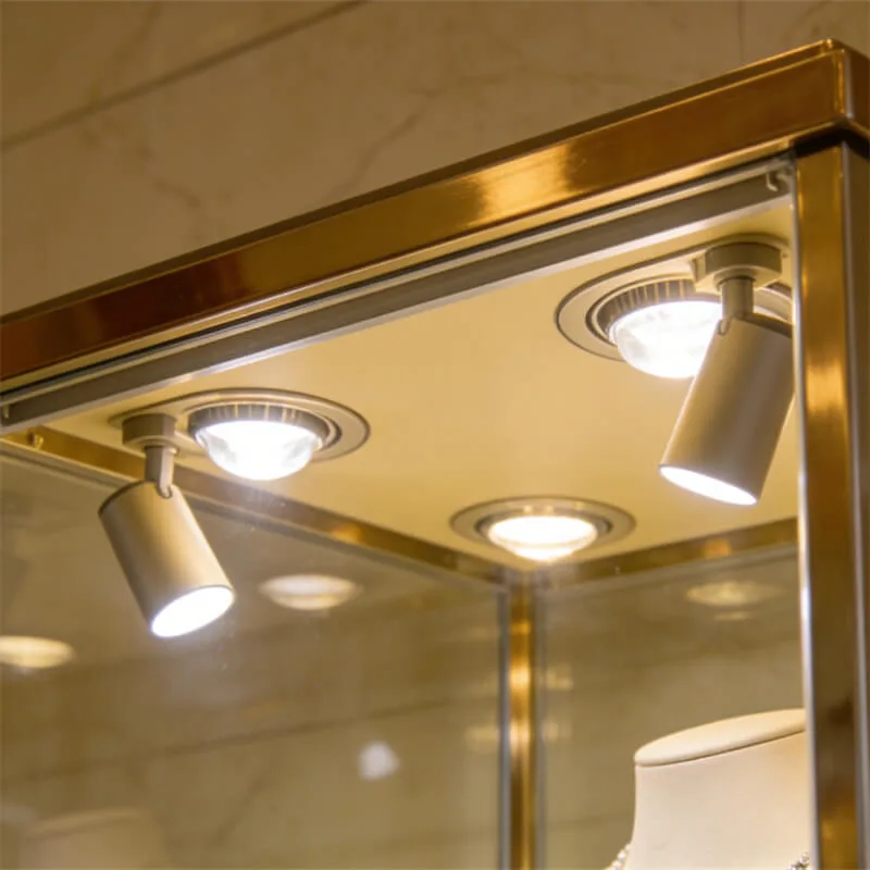 Modern Luxury Gold Plated Stainless Steel Vertical Jewelry Display Showcase with Built-in Adjustable Spotlights — view 4