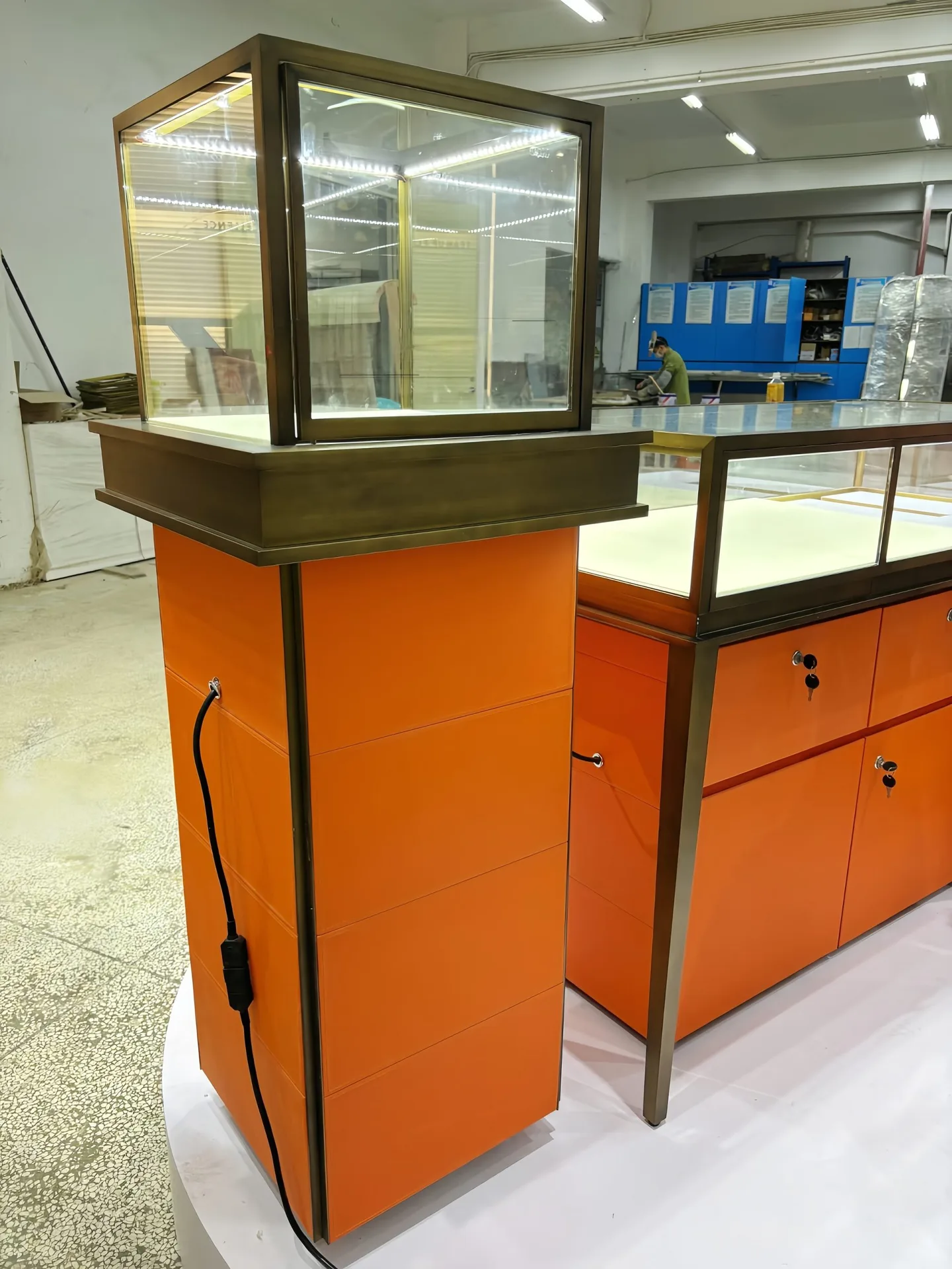Modern Orange Retail Display Cabinet with Brass Frame & Glass Showcase — view 8