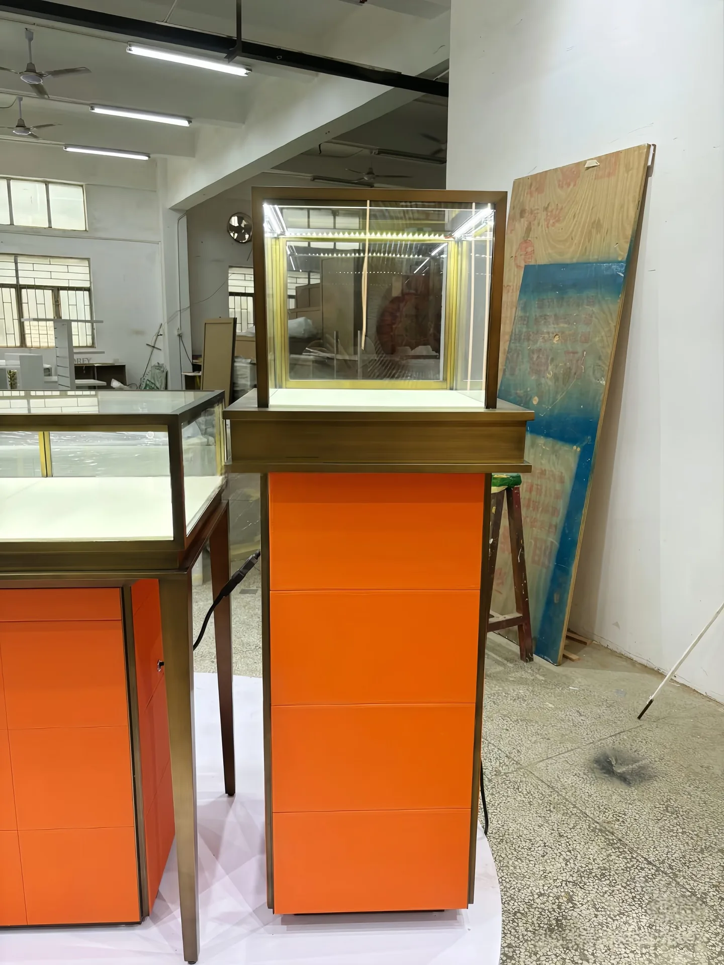 Modern Orange Retail Display Cabinet with Brass Frame & Glass Showcase — view 7