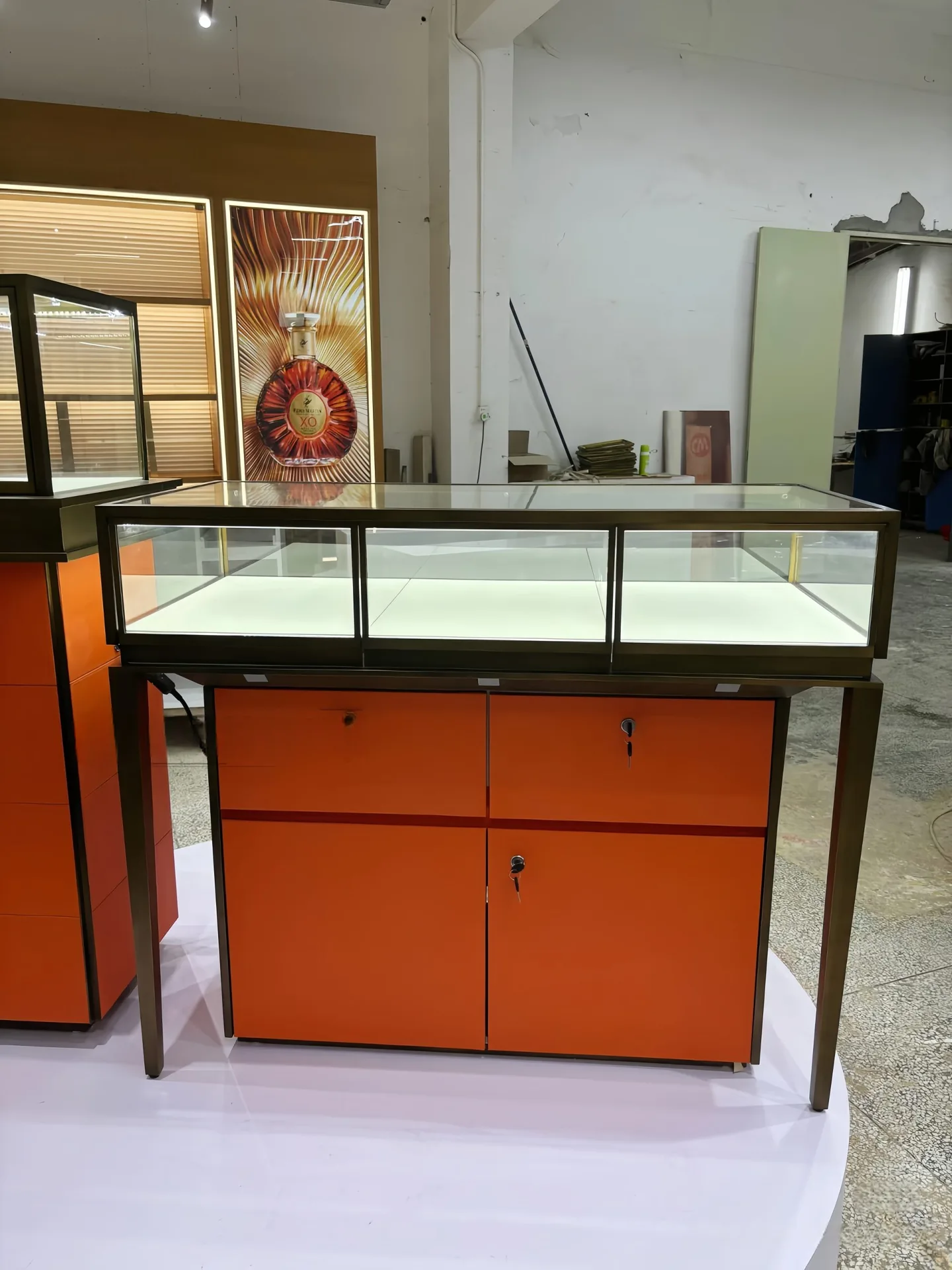 Modern Orange Retail Display Cabinet with Brass Frame & Glass Showcase — view 5