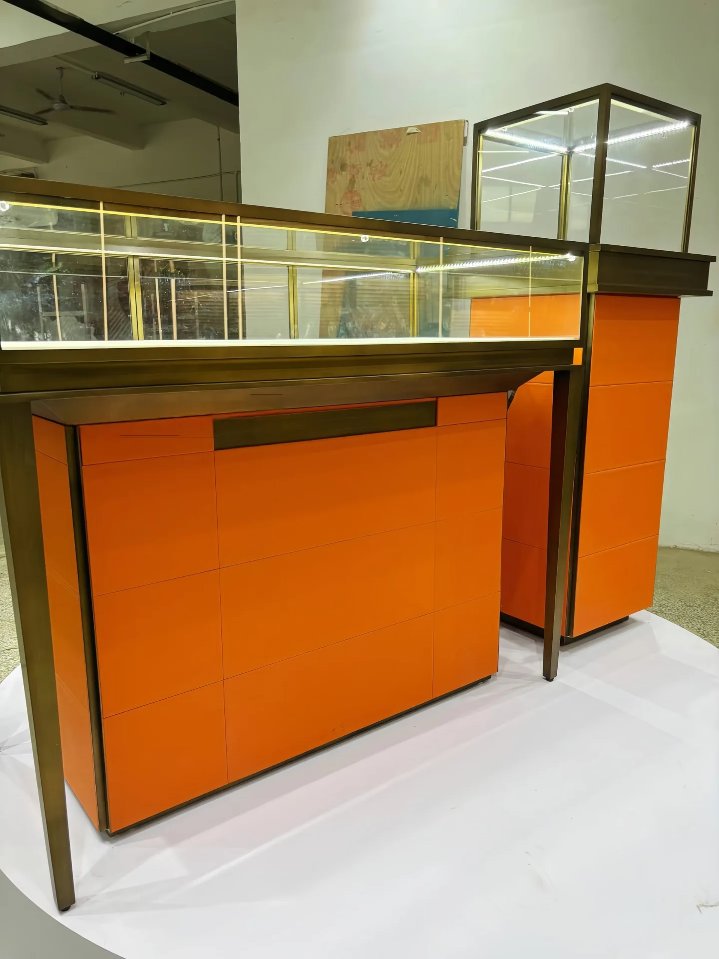 Modern Orange Retail Display Cabinet with Brass Frame & Glass Showcase — view 3