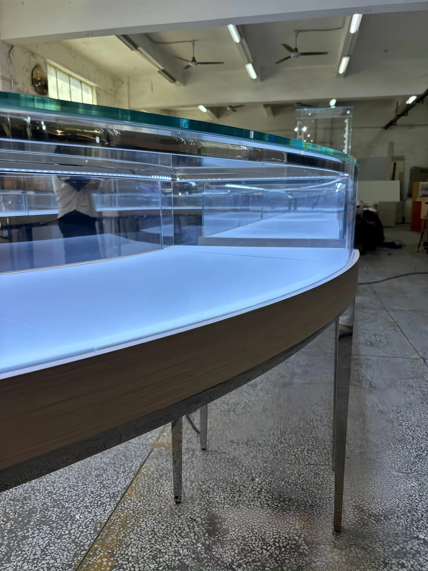 Modular Curved Glass Jewelry Display Counter | S-Shaped Retail Island with Metal Legs & White Top — view 2
