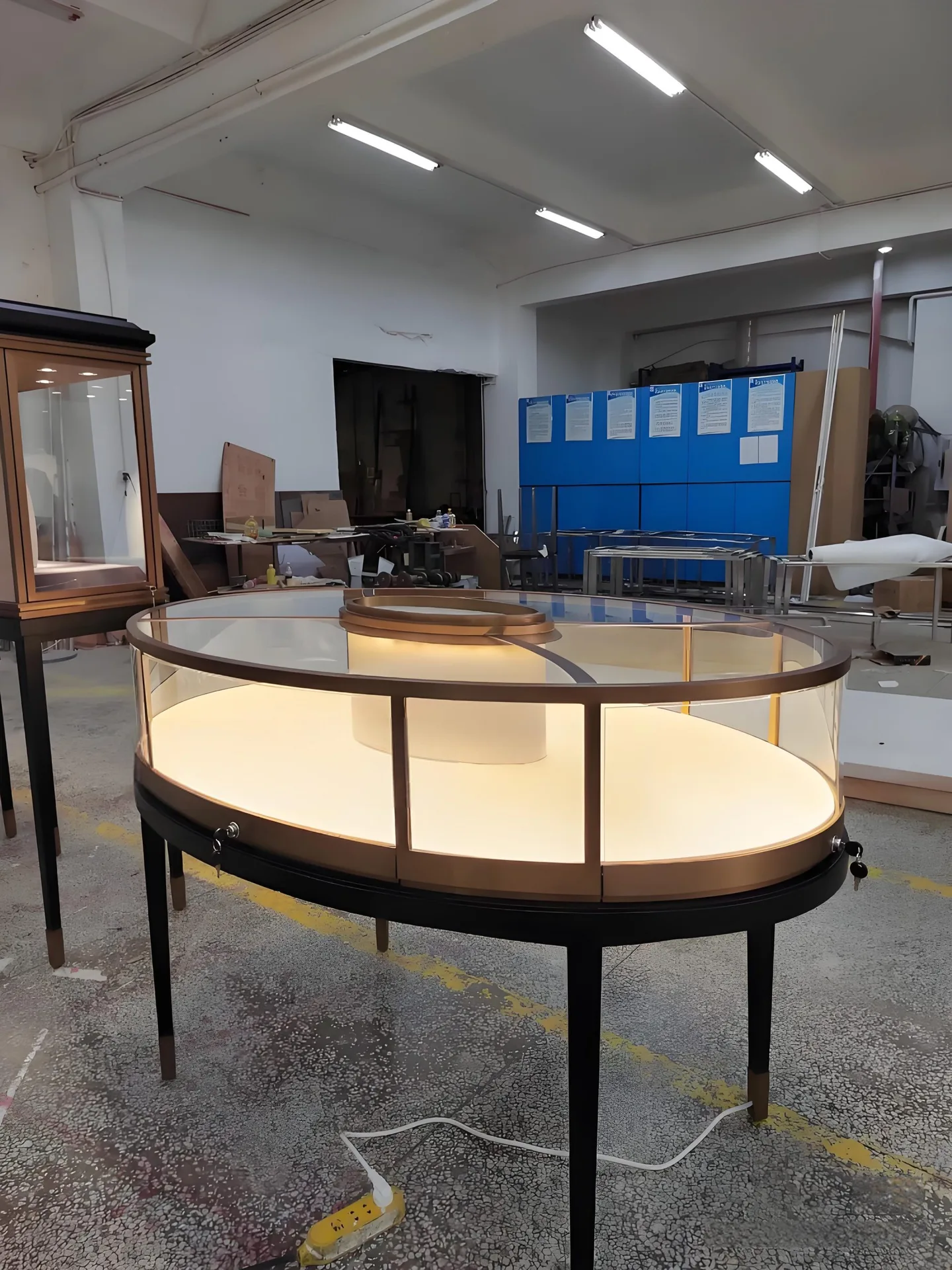 Oval Glass Display Showcase with Internal LED Lighting | Four-Leg Illuminated Counter — view 3