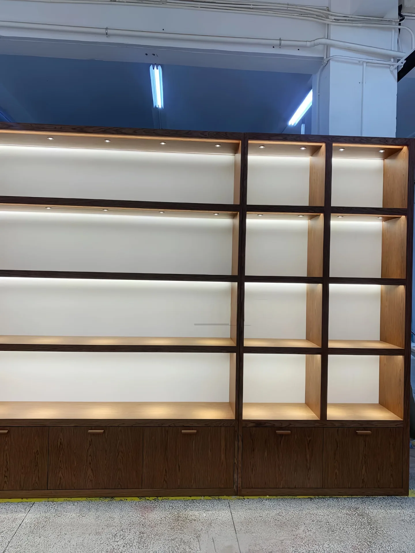 Wooden Grid Jewelry Display Cabinet With LED Lights & Storage Drawers For Jewelry Shop Wall