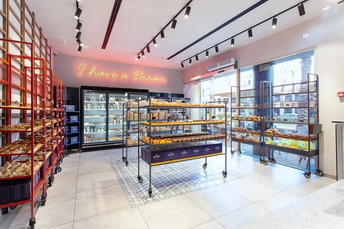 Dark Blue Cookie Shop Industrial Iron Display Shelves Attractive Biscuit Store Design