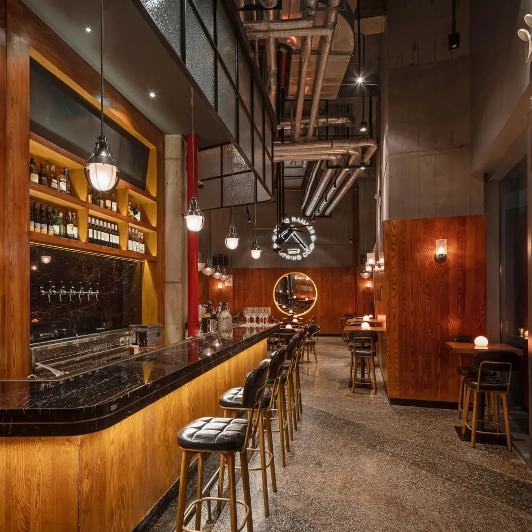 Tavern Design, Bar Displays, Commercial Furniture – Vintage Folk Pub Space Built Around Live Performance for Casual Drinking 